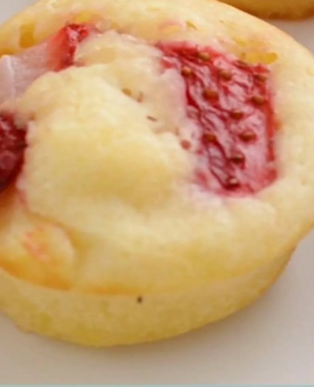 Fluffy mini pancake muffins arranged on a breakfast plate.