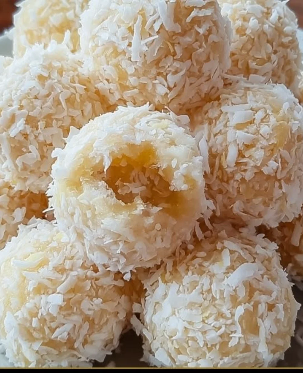 Sun-kissed pineapple coconut balls on a tropical-themed plate