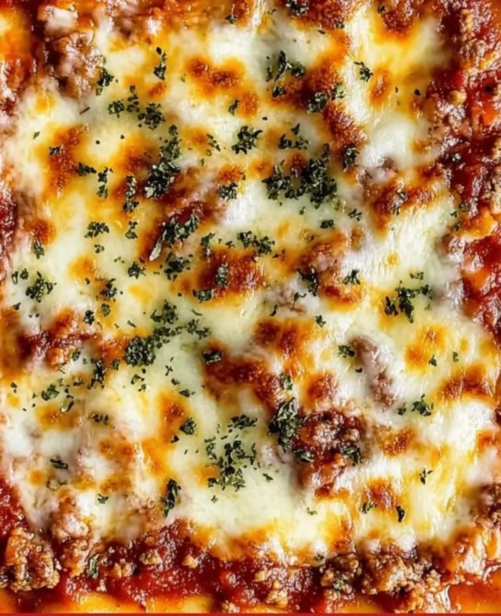 Delicious layered cheesy lasagna with melted cheese and rich tomato sauce