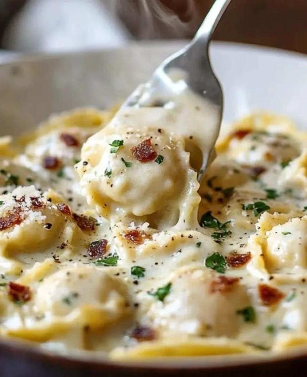 Creamy Olive Garden ravioli carbonara dish served in a bowl with ingredients