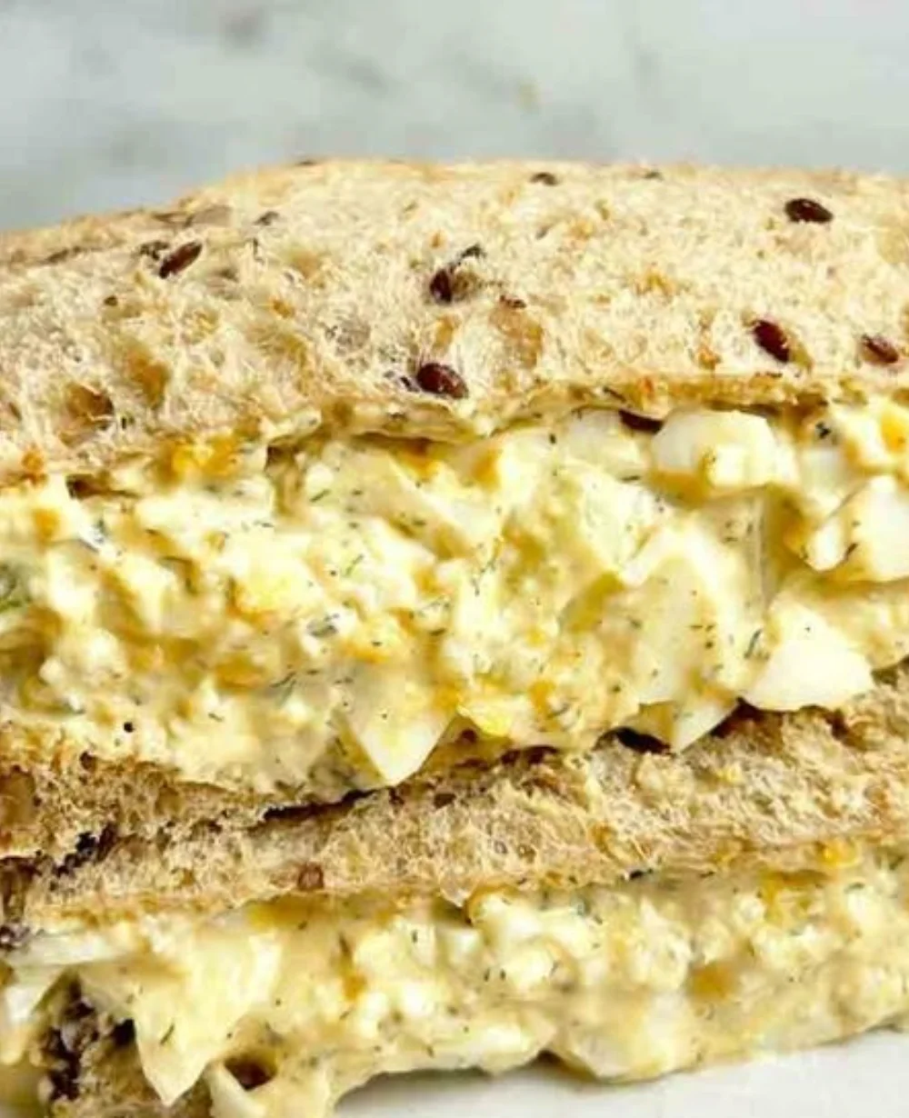 Creamy egg salad sandwich made with a quick and easy recipe.