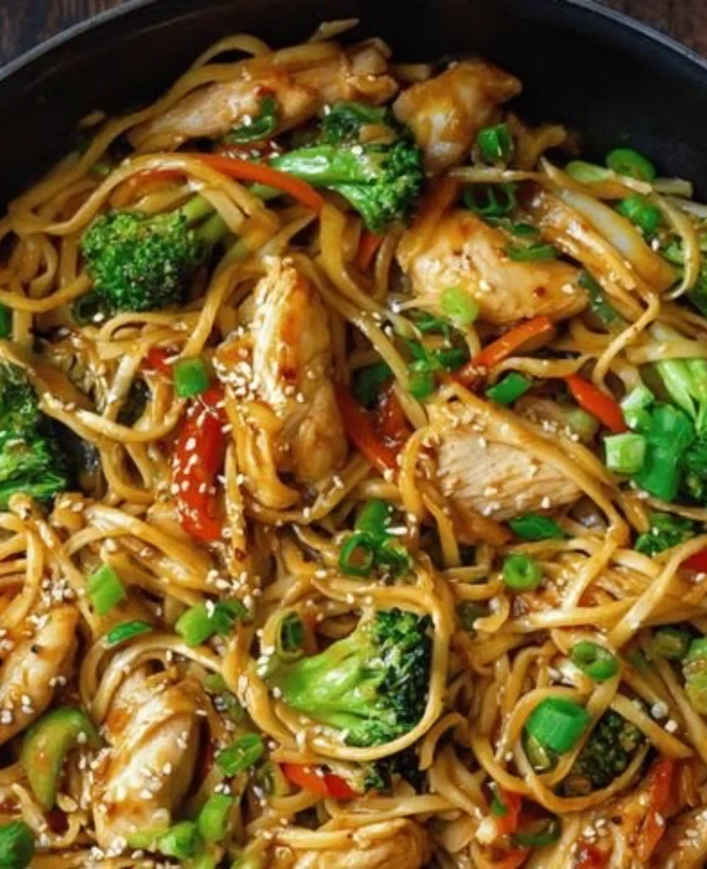 Delicious quick chicken stir fry noodles in a colorful dish