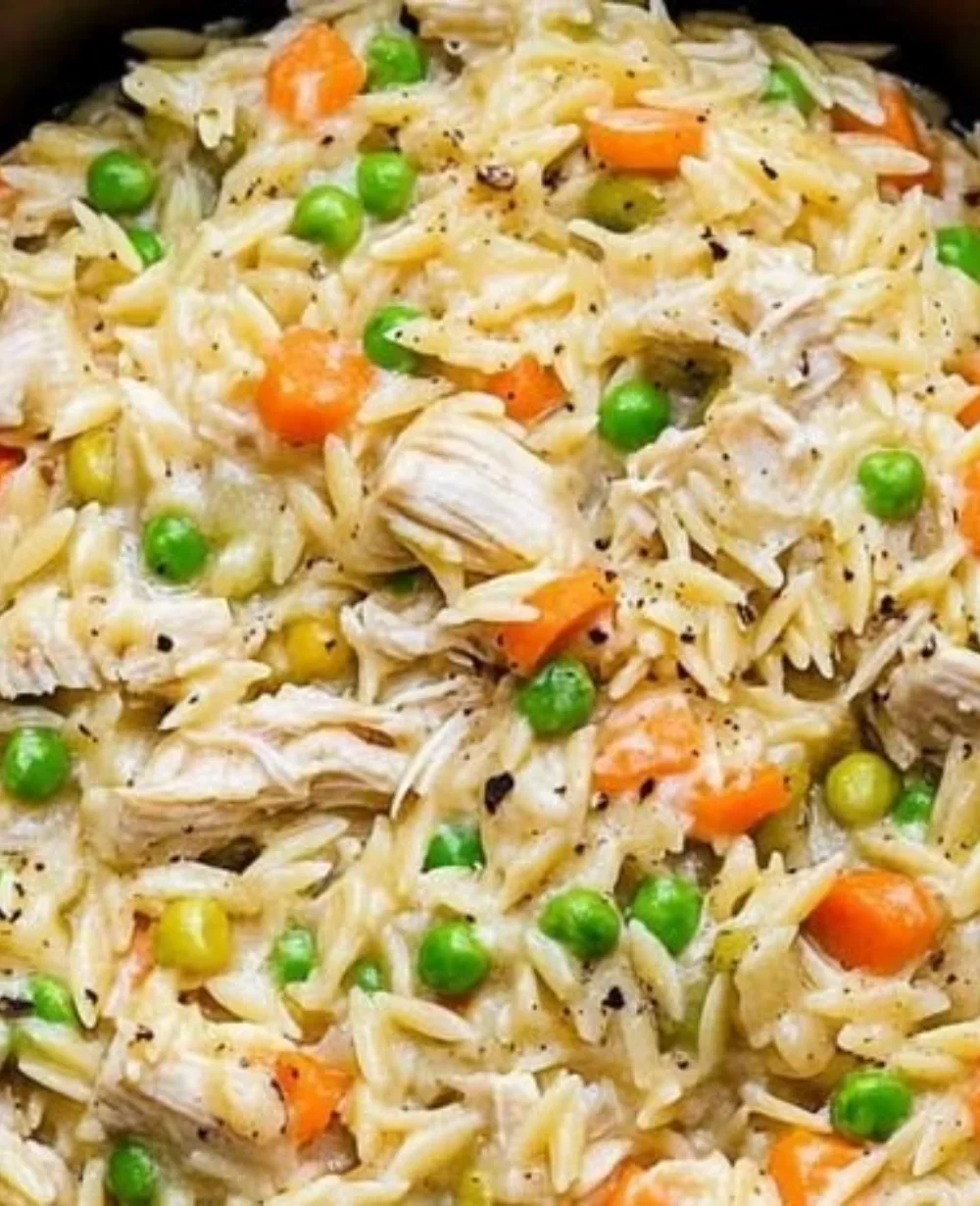 Creamy chicken pot pie orzo served in a bowl, perfect comfort food dish.