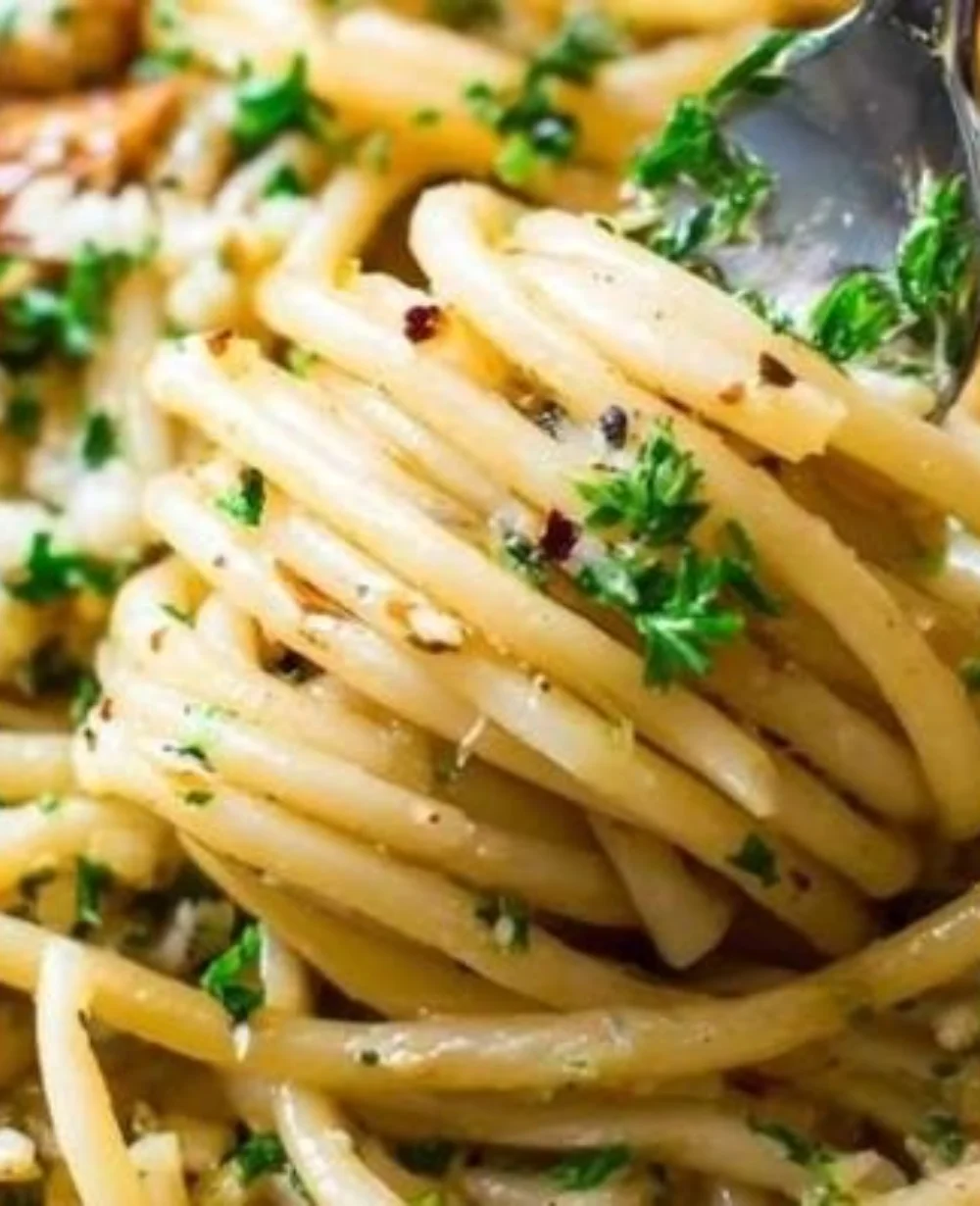 Delicious Alio Olio Pasta cooked to high-energy perfection with garlic and olive oil.