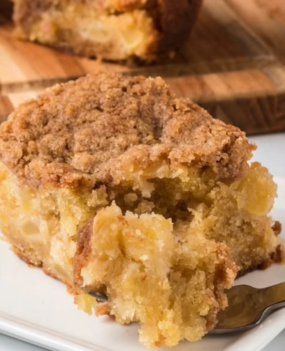 Delicious homemade Apple Crumb Cake with a golden crumb topping