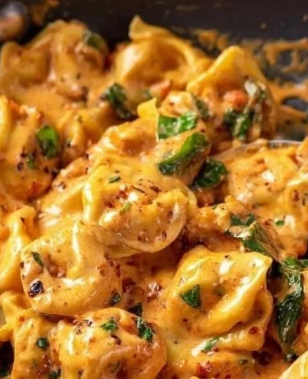 Creamy Marry Me Tortellini dish served in a cozy setting