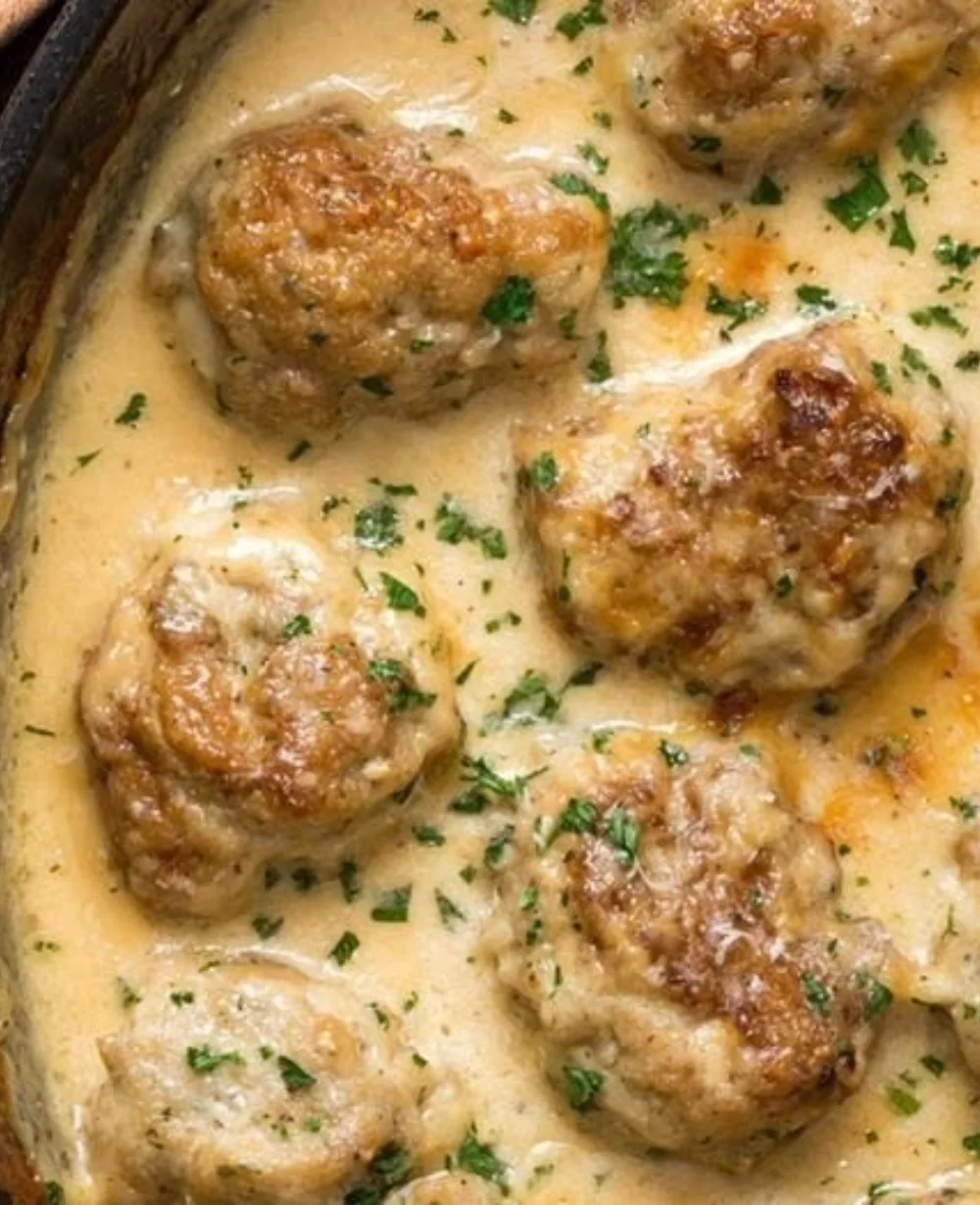 Plate of flavorful Keto Turkey Meatballs garnished with herbs