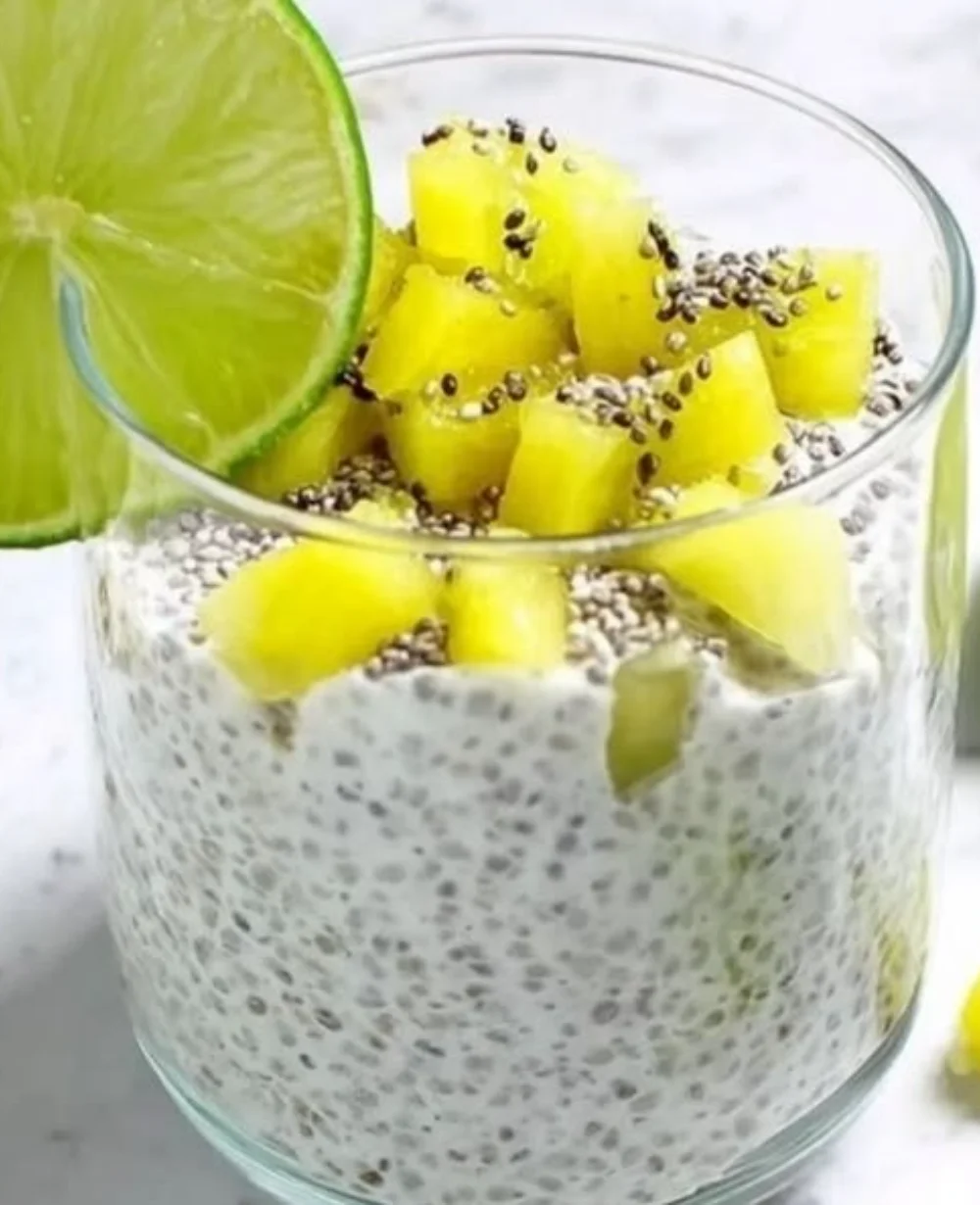 No-bake chia pudding bars topped with fresh fruit and nuts