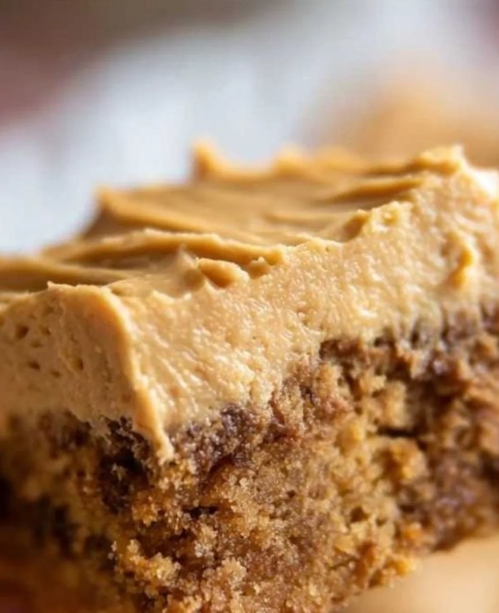 Delicious peanut butter cookie bars served on a rustic wooden table