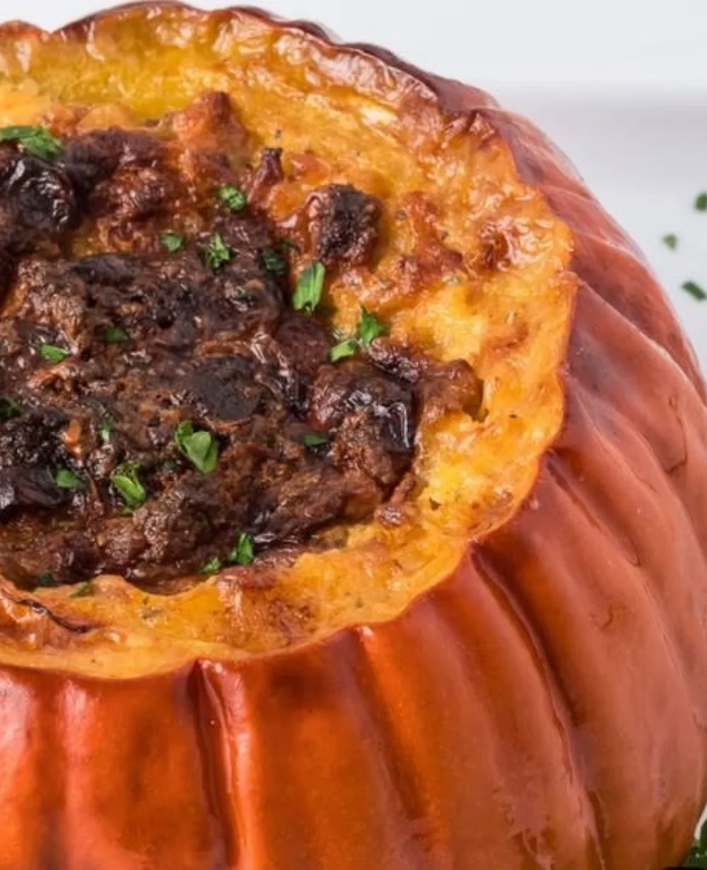 Delicious stuffed pumpkin filled with savory ingredients for a festive meal