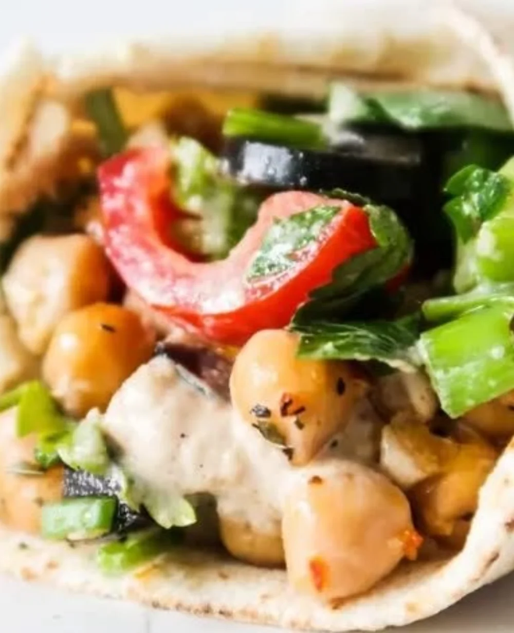 Sun-kissed Mediterranean chickpea wraps filled with fresh veggies and herbs